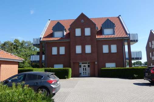 Hausansicht - Etagenwohnung in 27639 Wurster Nordseeküste mit 52m² kaufen