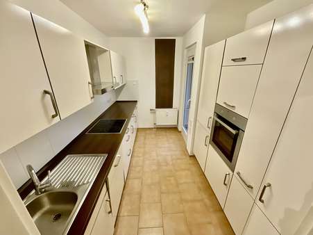 Küche / Zugang Balkon - Etagenwohnung in 21614 Buxtehude mit 85m² kaufen