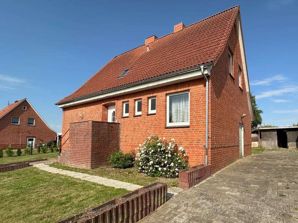 Vorderansicht - Einfamilienhaus in 21706 Drochtersen mit 98m² kaufen