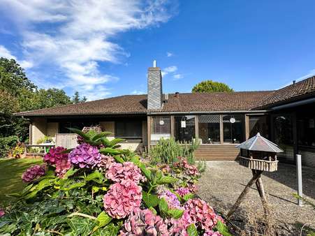Terrassenansicht Terrassenansicht - Zweifamilienhaus in 21717 Fredenbeck mit 274m² kaufen