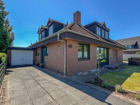 Seitenansicht - Einfamilienhaus in 27449 Kutenholz mit 177m² kaufen