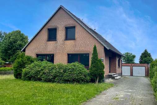 Vorderansicht - Einfamilienhaus in 28879 Grasberg mit 143m² kaufen