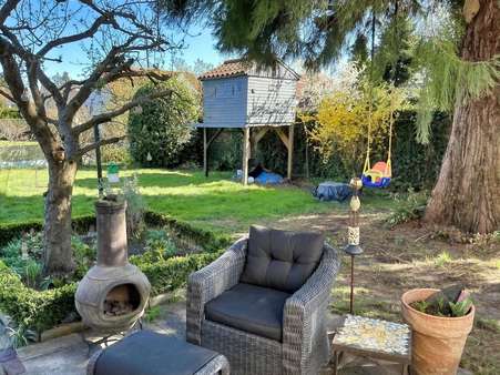 Ausblick von der Terrasse in den Garten - Einfamilienhaus in 28777 Bremen mit 170m² kaufen