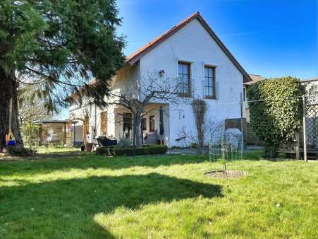 seitlicher Blick zur Gartenseite - Einfamilienhaus in 28777 Bremen mit 170m² kaufen