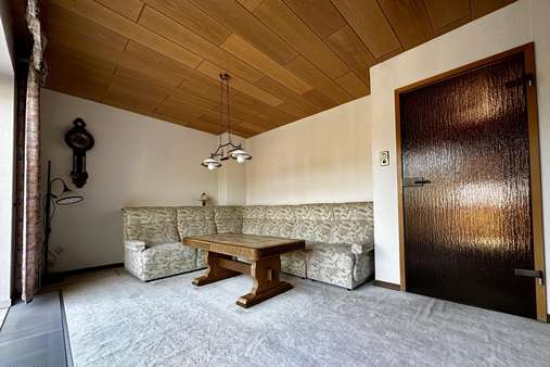 Wohnzimmer mit Schiebetür - Reihenmittelhaus in 38229 Salzgitter mit 65m² kaufen