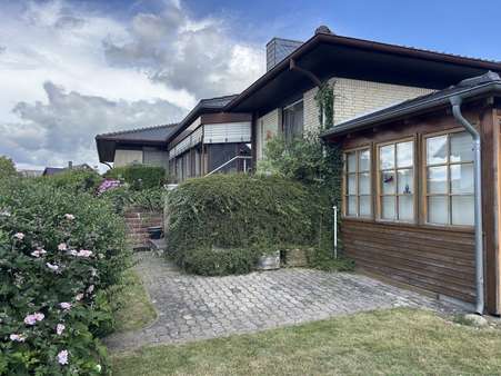 Ansicht Wintergarten mit Raffstoreanlage - Einfamilienhaus in 38462 Grafhorst mit 159m² kaufen