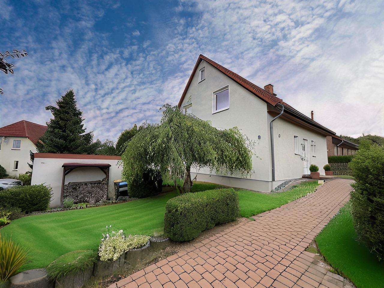 Ansicht Seite Hauseingang Ansicht Seite Hauseingang - Einfamilienhaus in 38170 Schöppenstedt mit 118m² kaufen