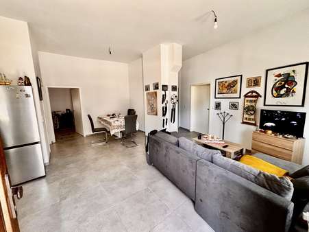 offenes Wohnzimmer - Etagenwohnung in 30559 Hannover mit 126m² kaufen