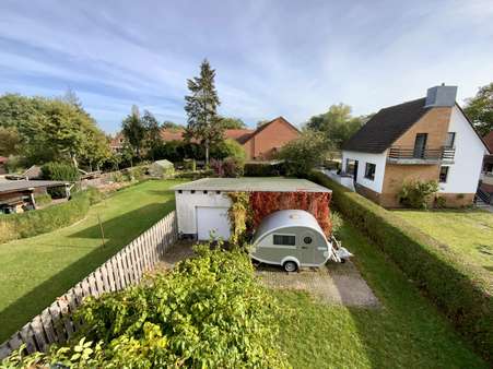 Blick in den Garten - Einfamilienhaus in 30900 Wedemark mit 90m² kaufen