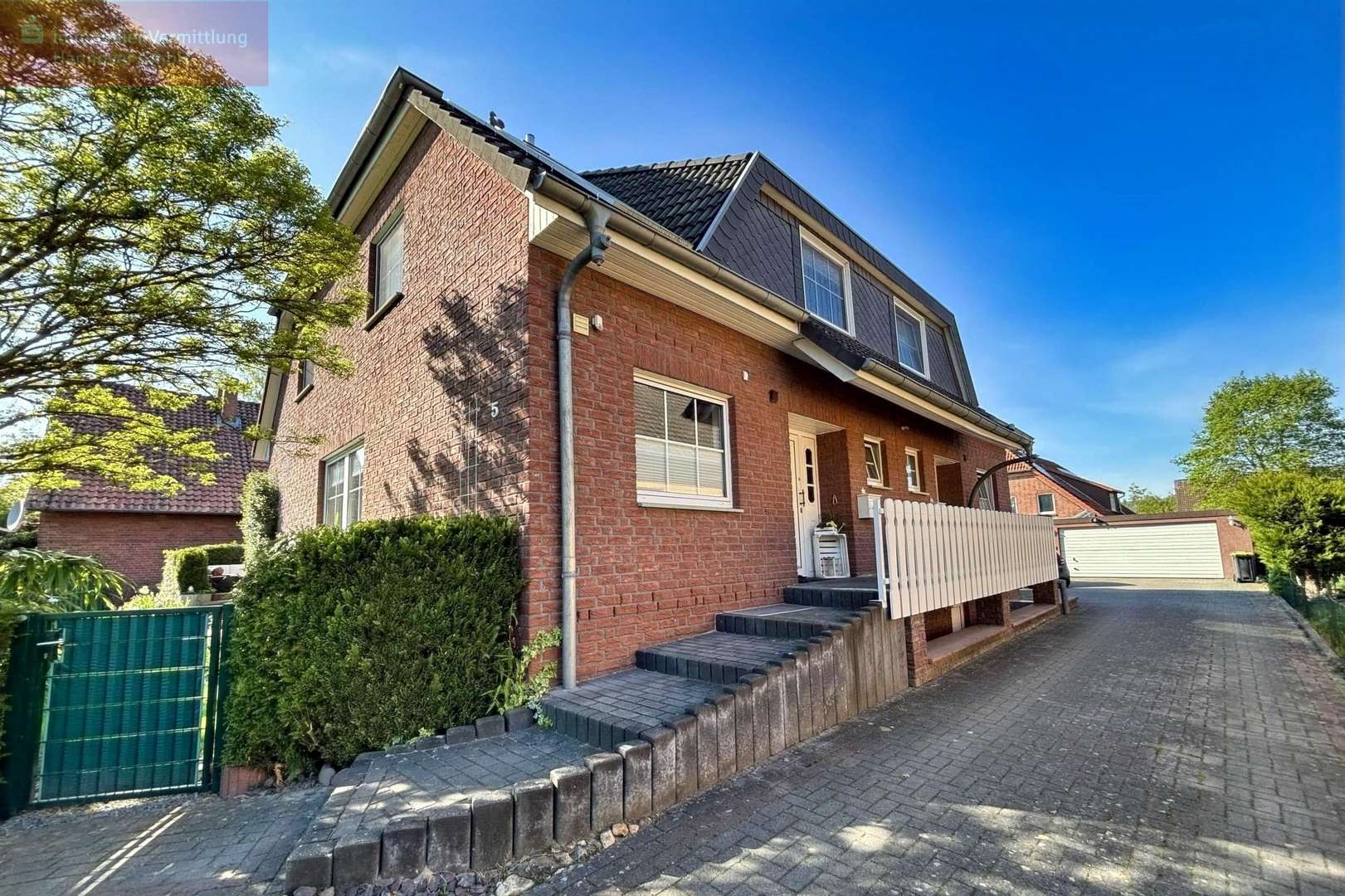 Vorderansicht - Doppelhaushälfte in 31515 Wunstorf mit 117m² kaufen