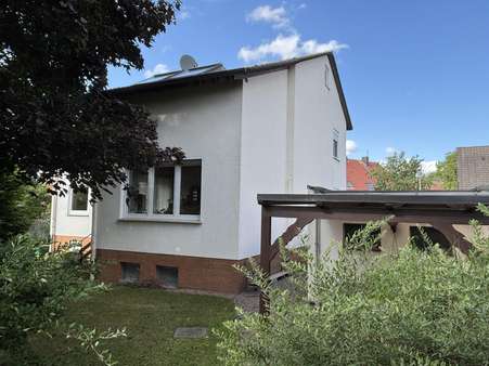 Haus Rückansicht Haus Rückansicht - Zweifamilienhaus in 30989 Gehrden mit 166m² kaufen