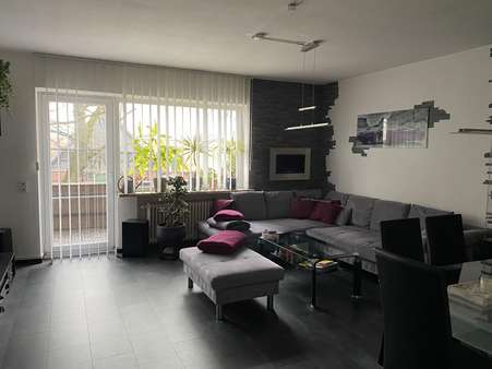 Wohnzimmer - Etagenwohnung in 30855 Langenhagen mit 88m² kaufen