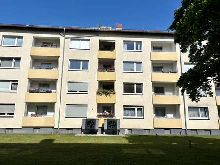 Rückansicht Gebäude - Etagenwohnung in 30966 Hemmingen mit 68m² kaufen