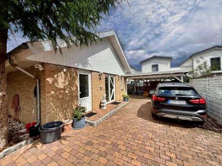 Hauseingang Hauseingang - Bungalow in 30938 Burgwedel mit 135m² kaufen