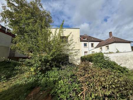 Blick auf das Haus (rückwärtig) Blick auf das Haus (rückwärtig) - Mehrfamilienhaus in 30419 Hannover mit 170m² kaufen