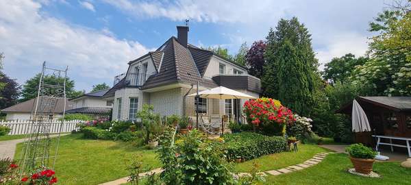 Gartenansicht - Einfamilienhaus in 30855 Langenhagen mit 170m² kaufen