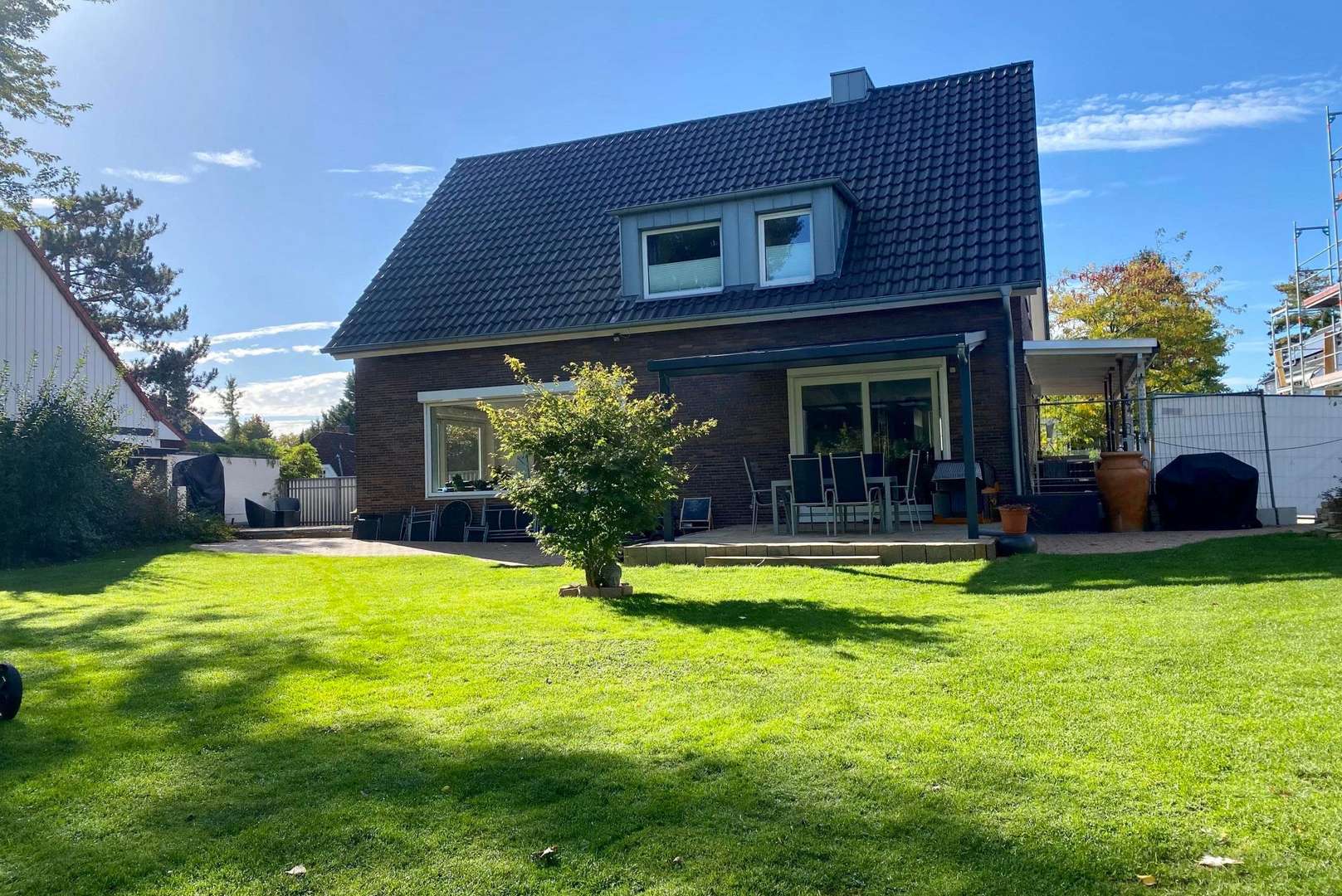 Ansicht aus dem Garten - Einfamilienhaus in 30916 Isernhagen mit 200m² günstig kaufen