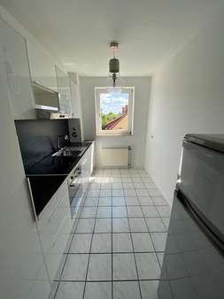 Küche mit Einbauküche - Etagenwohnung in 30823 Garbsen mit 80m² kaufen