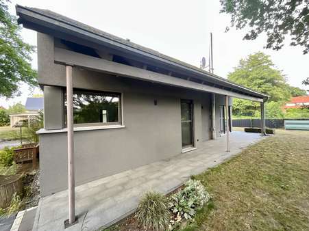 seitliche Ansicht seitliche Ansicht - Einfamilienhaus in 30900 Wedemark mit 125m² kaufen