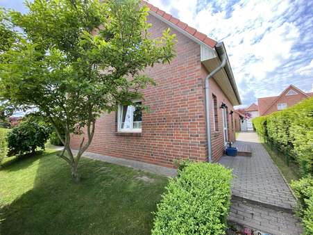 Haus Rückansicht - Einfamilienhaus in 30890 Barsinghausen mit 116m² günstig kaufen