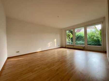 Wohnzimmer Wohnzimmer - Erdgeschosswohnung in 30900 Wedemark mit 76m² kaufen