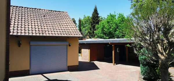 Garage / Carport mit Wallbox Garage / Carport mit Wallbox - Zweifamilienhaus in 31535 Neustadt mit 189m² kaufen
