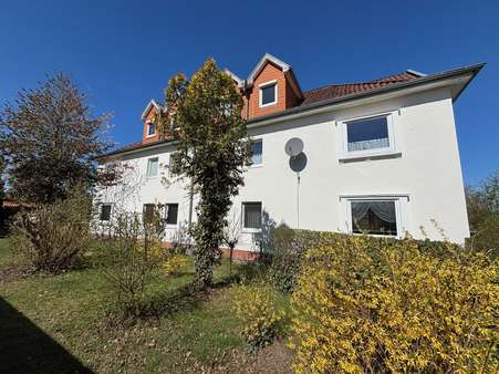 Seitliche Ansicht - Mehrfamilienhaus in 30900 Wedemark mit 492m² kaufen