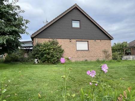 Ansicht aus dem Garten - Einfamilienhaus in 30890 Barsinghausen mit 123m² kaufen
