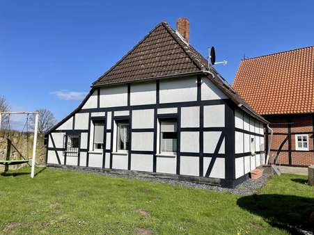 Wohnhaus Ansicht aus dem Garten - Einfamilienhaus in 30890 Barsinghausen mit 86m² kaufen