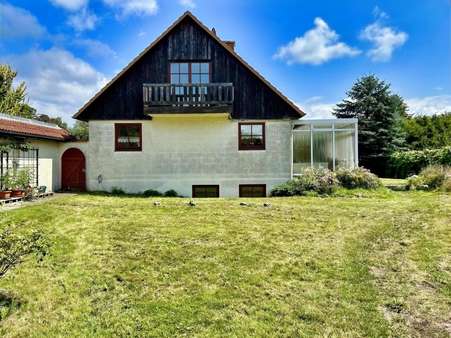 Rückwärtige Hausansicht mit Garten Rückwärtige Hausansicht mit Garten - Einfamilienhaus in 29664 Walsrode mit 147m² kaufen