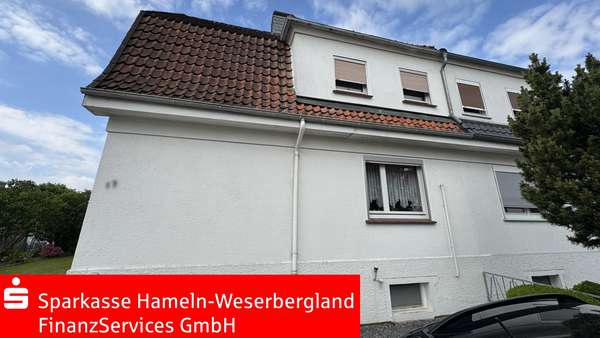 Straßenansicht Straßenansicht - Doppelhaushälfte in 31855 Aerzen mit 110m² kaufen