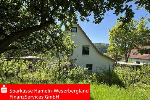 Ansicht aus dem Garten - Einfamilienhaus in 37619 Bodenwerder mit 155m² kaufen