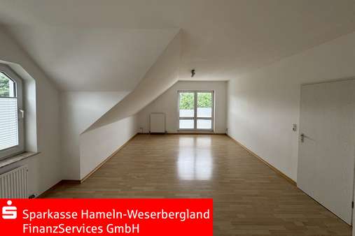 Wohnzimmer Wohnzimmer - Dachgeschosswohnung in 31840 Hessisch Oldendorf mit 84m² kaufen