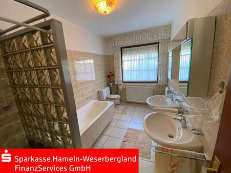 Gepflegtes Dusch_und_Wannenbad - Bungalow in 31840 Hessisch Oldendorf mit 116m² günstig kaufen