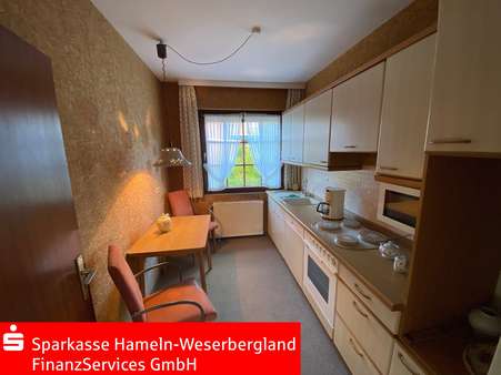 Teilansicht Küche - Bungalow in 31840 Hessisch Oldendorf mit 116m² günstig kaufen