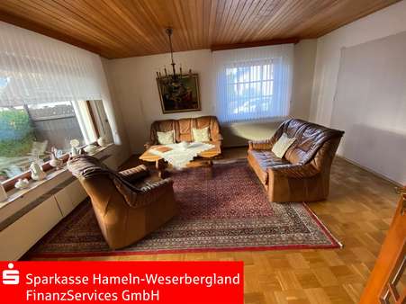 Wohnzimmer - Bungalow in 31840 Hessisch Oldendorf mit 116m² günstig kaufen