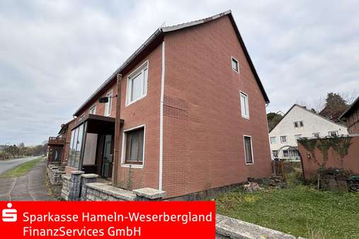 Seitenansicht Seitenansicht - Einfamilienhaus in 37620 Halle mit 140m² kaufen