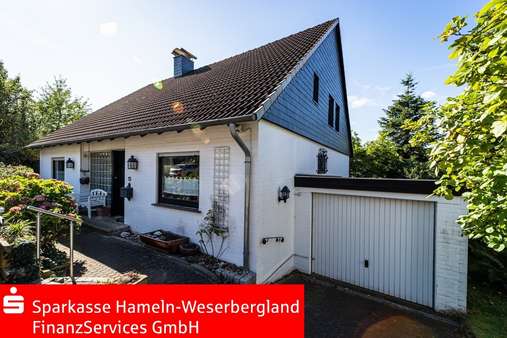 Seitliche Ansicht - Einfamilienhaus in 37619 Bodenwerder mit 172m² kaufen