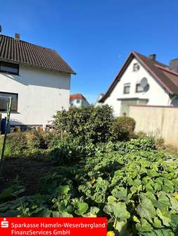 Blick vom Garten - Zweifamilienhaus in 31840 Hessisch Oldendorf mit 160m² kaufen