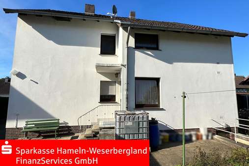 Rückwärtige Ansicht - Zweifamilienhaus in 31840 Hessisch Oldendorf mit 160m² kaufen
