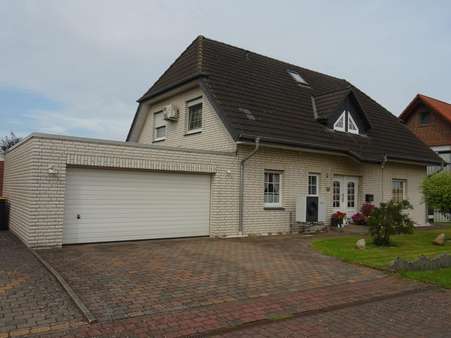 Ostansicht zur Strasse Ostansicht zur Strasse - Einfamilienhaus in 31712 Niedernwöhren mit 146m² kaufen