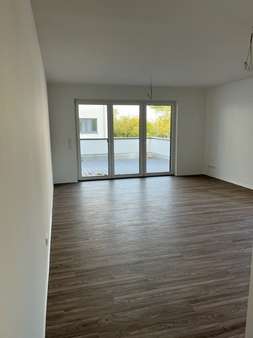 Wohnzimmer - Erdgeschosswohnung in 31542 Bad Nenndorf mit 71m² kaufen