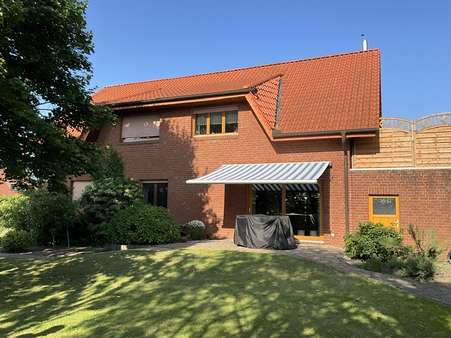 Gartenansicht - Zweifamilienhaus in 31633 Leese mit 196m² kaufen