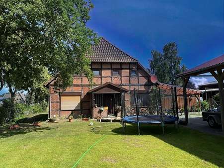 Hausansicht mit Eingangsbereich Hausansicht mit Eingangsbereich - Zweifamilienhaus in 31637 Rodewald mit 230m² kaufen