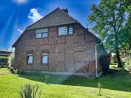 Seitenansicht Seitenansicht - Zweifamilienhaus in 31637 Rodewald mit 230m² kaufen