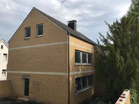 Rückwärtige Ansicht - Mehrfamilienhaus in 31582 Nienburg mit 252m² günstig kaufen