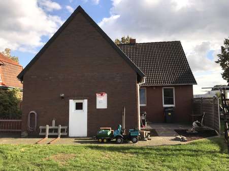 Hintere Ansicht - Einfamilienhaus in 31582 Nienburg mit 110m² günstig kaufen