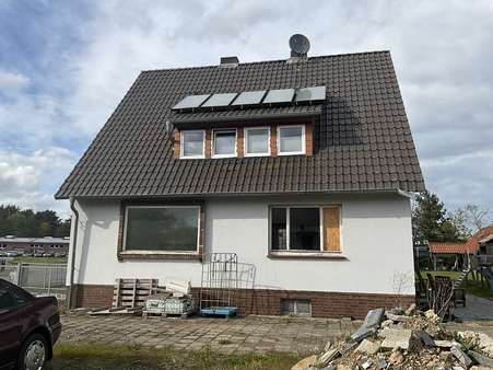Seitenansicht - Einfamilienhaus in 31623 Drakenburg mit 133m² kaufen
