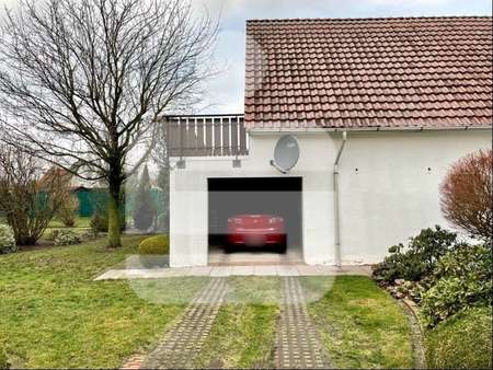 Seitenansicht mit Garage - Zweifamilienhaus in 27232 Sulingen mit 241m² kaufen