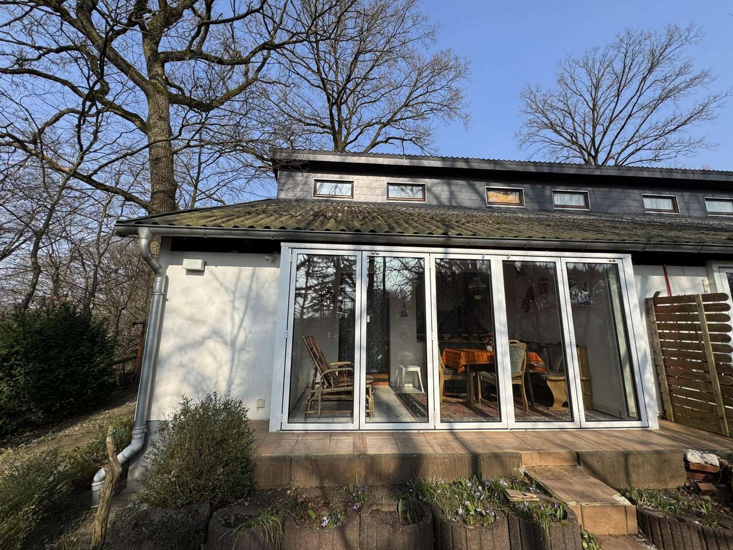 Außensicht mit Wintergarten - Reihenendhaus in 29556 Suderburg mit 61m² kaufen